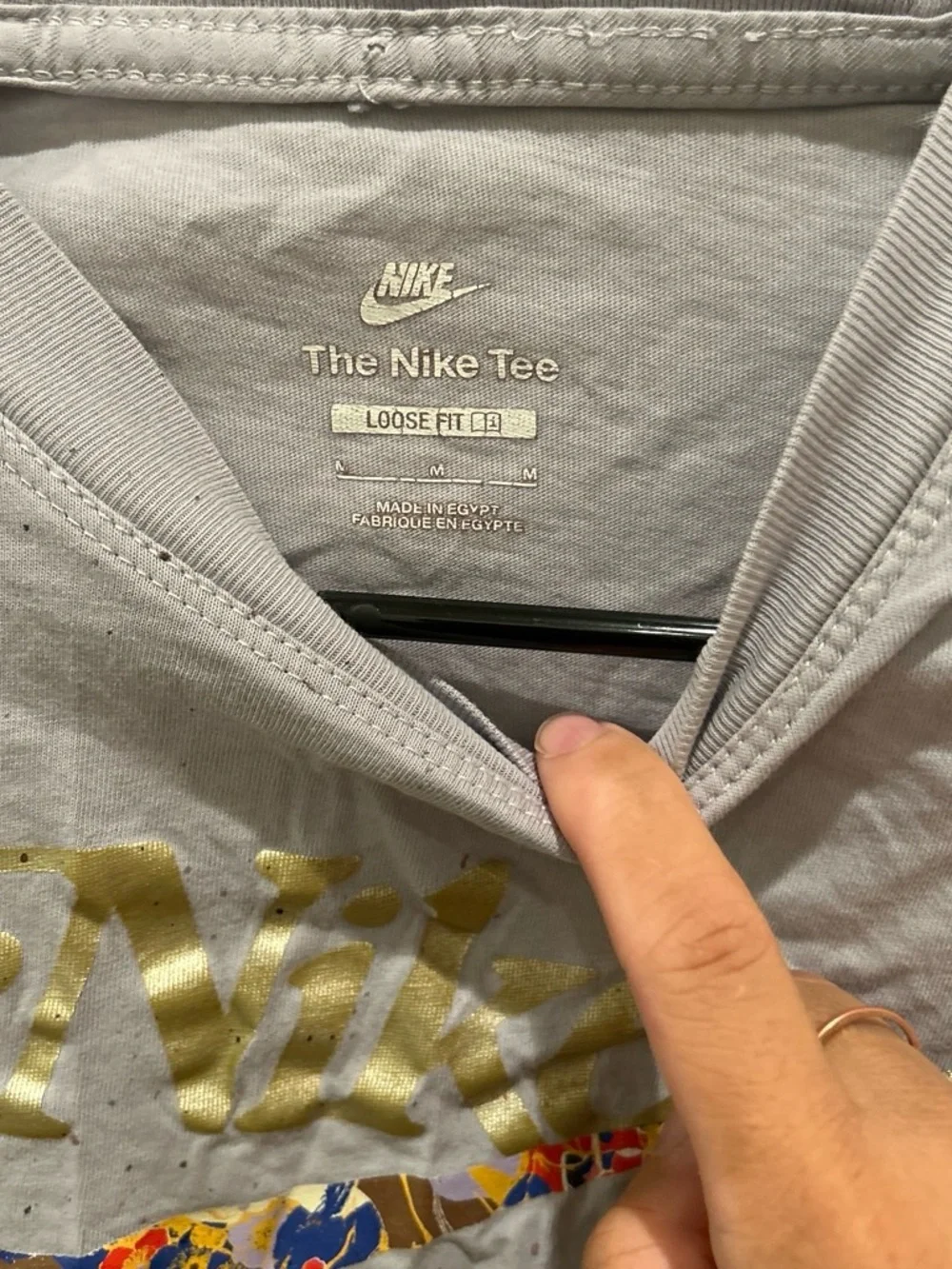 Nike White Tee with Multicolor Floral Swoosh and Gold Script